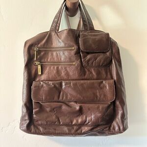 HOBO - adjustable shoulder strap and carry handle.  Classic soft leather.